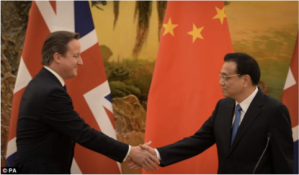 David Cameron shakes Premier Li's hand after discussions about Trade and HS2.